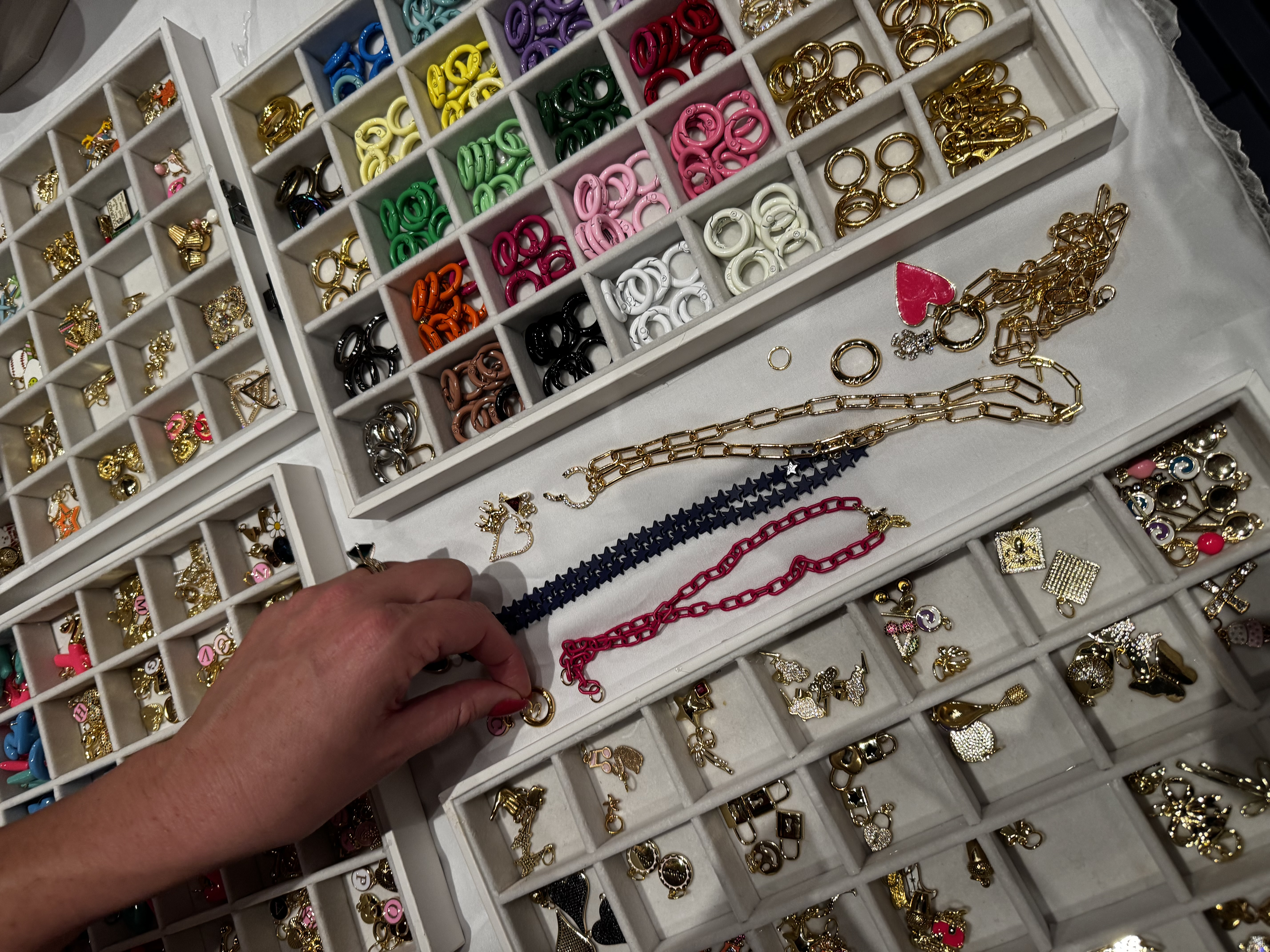 Trays of curated charms